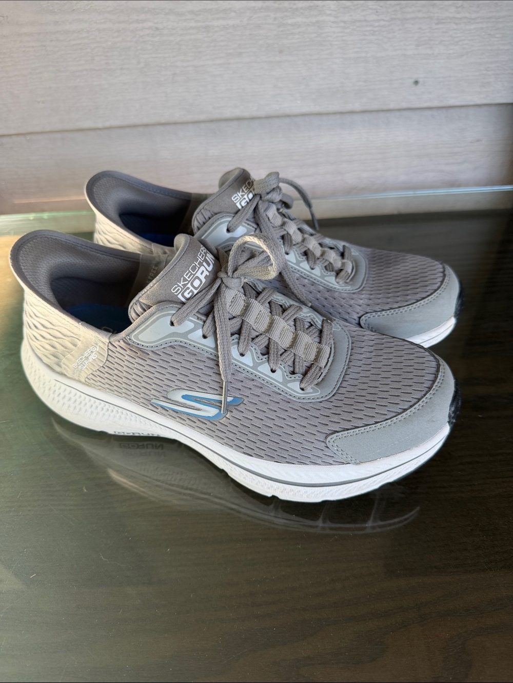 Skechers Men's Gray Athletic Walking Sneakers with Subtle Blue Accent